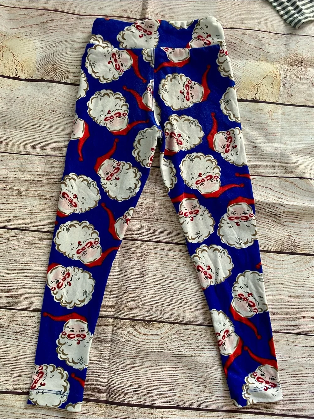 Boutique Red 'Believe' Top with Lula Roe Blue Santa Face Leggings
